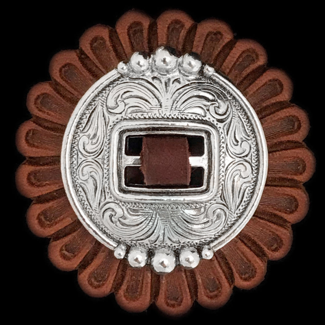 Silver Rounded slotted concho with scalloped-bead top and base, piped edge and engraved scrollwork. 
